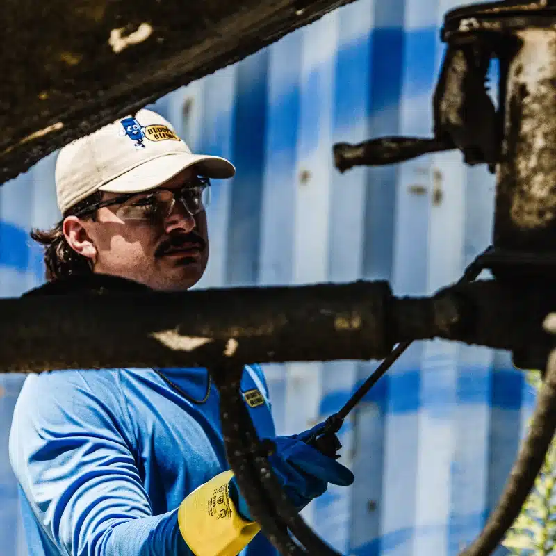 Man wearing Buddy's Blends chemical safety gloves