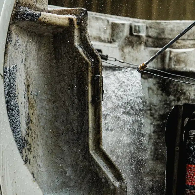 Buddy's Blends CITRUMAX PRO heavy duty industrial degreaser cleaner being used on a tanker truck hood